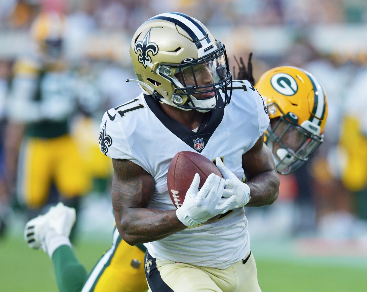 New Orleans Saints receiver Deonte Harris (11) pulls in a 55 yard touchdown pass from quarterback Jameis Winston (2) against the Packers. © Bob Self/Florida Times-Union via Imagn Content Services, LLC